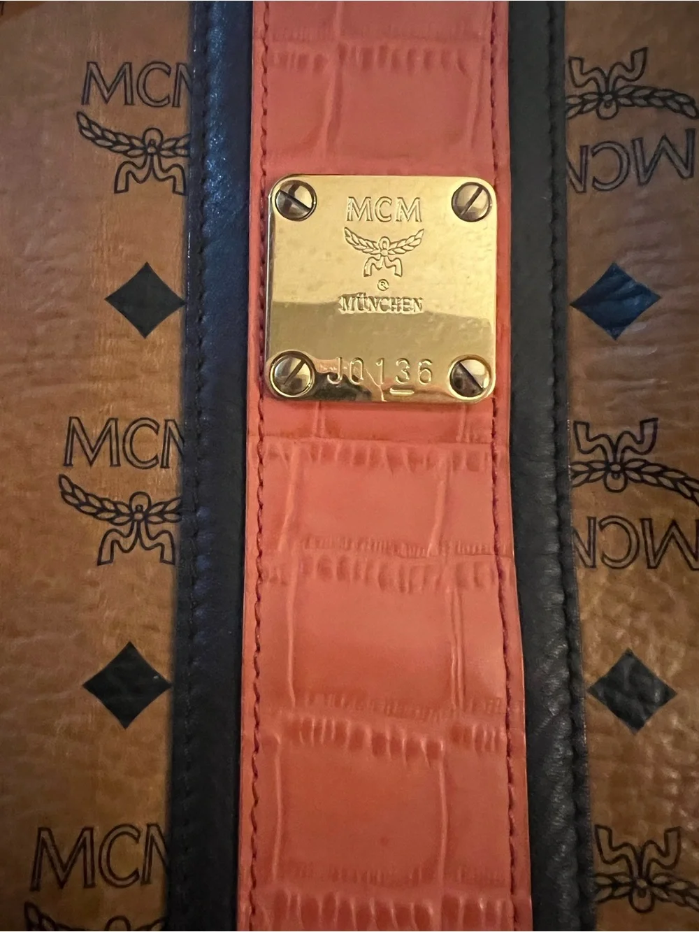 MCM gold tone